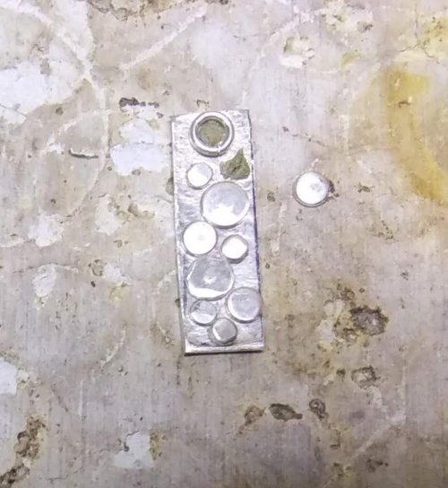 Judy Larson's Tiny Silver Charms part 1 - , Contemporary Wire Jewelry, How To Punch Holes, Hole Punching, Punch A Hole, Texturing, Butane Torch, Soldering, Solder, tiny charms